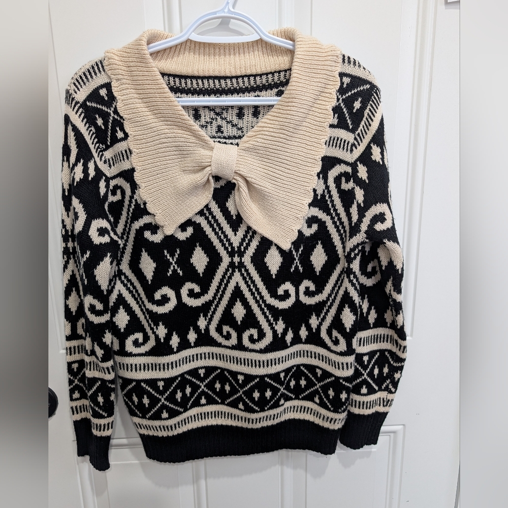 Elegant Black and Cream Cowl Neck Sweater